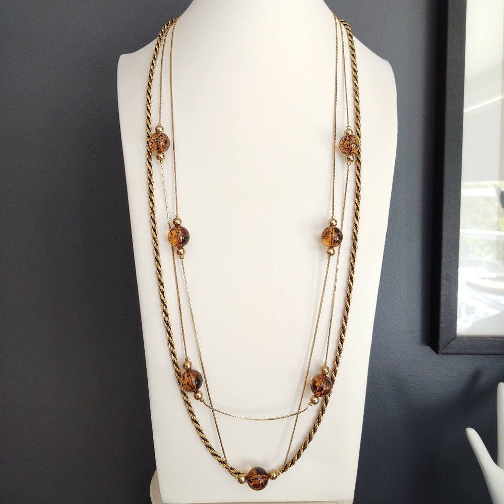 3 strand gold, twisted and beaded necklace